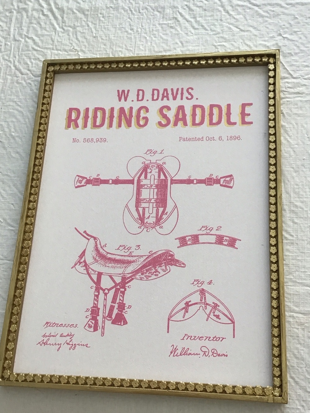 Ashland Pink Riding Saddle Patent Wall Art in Gold Frame